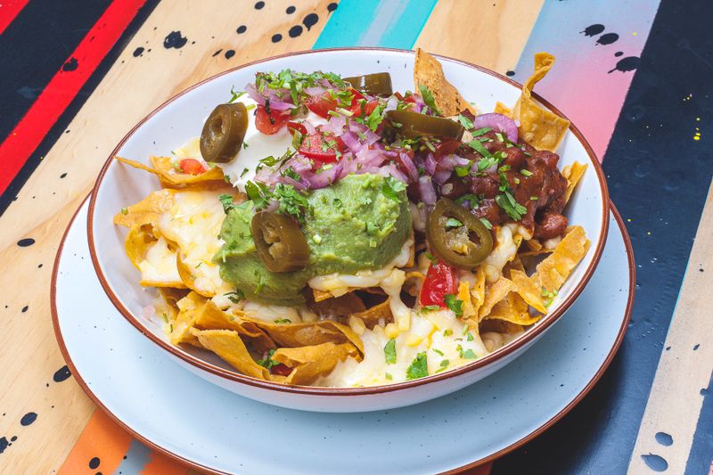 Loaded nachos with toppings at GYG